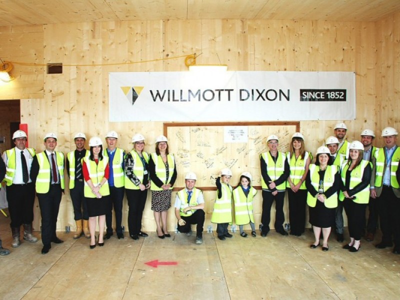 Wall signing signals key milestone for school extensions